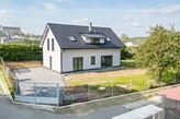 Prodej novostavby rodinného domu 7+kk v Kozmicích 
